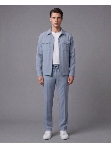 Blending modern safari inspiration with advanced performance fabric technology, this blue mens suit offers ultimate freedom of movement with its comf